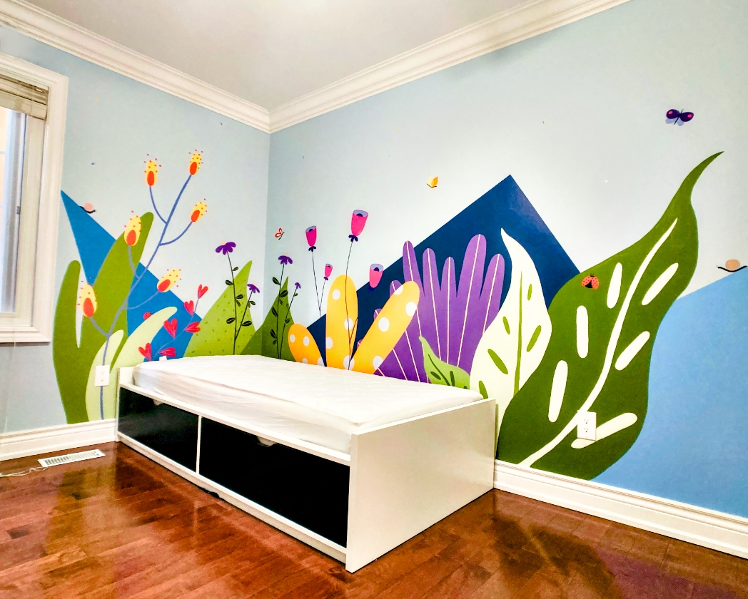 Wildflower garden mural full room view with single bed, oversized tropical plants, blooms, and butterflies on light blue wall